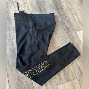🛍️ Love & Sports black with gold logo legging new condition.